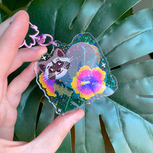 Load image into Gallery viewer, Hibiscus Raccoon - 2.5" holographic acrylic keychain