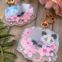 Load image into Gallery viewer, Cherry Blossom Opossum - 2.5" holographic acrylic keychain
