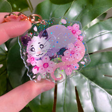 Load image into Gallery viewer, Cherry Blossom Opossum - 2.5" holographic acrylic keychain