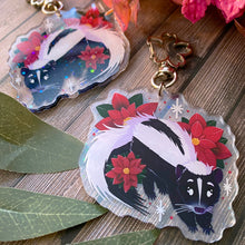 Load image into Gallery viewer, Poinsettia Skunk - 2.5" holographic acrylic keychain