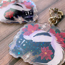 Load image into Gallery viewer, Poinsettia Skunk - 2.5" holographic acrylic keychain